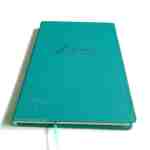 in sổ da bìa làm từ PU ép chìm logo